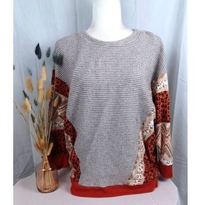 Patchwork Animal-Print Crewneck Sweater in Rust and Heather Gray
